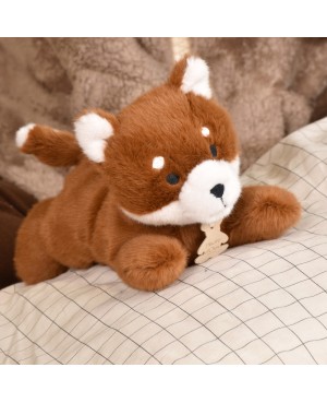 Panda roux peluche allongee...